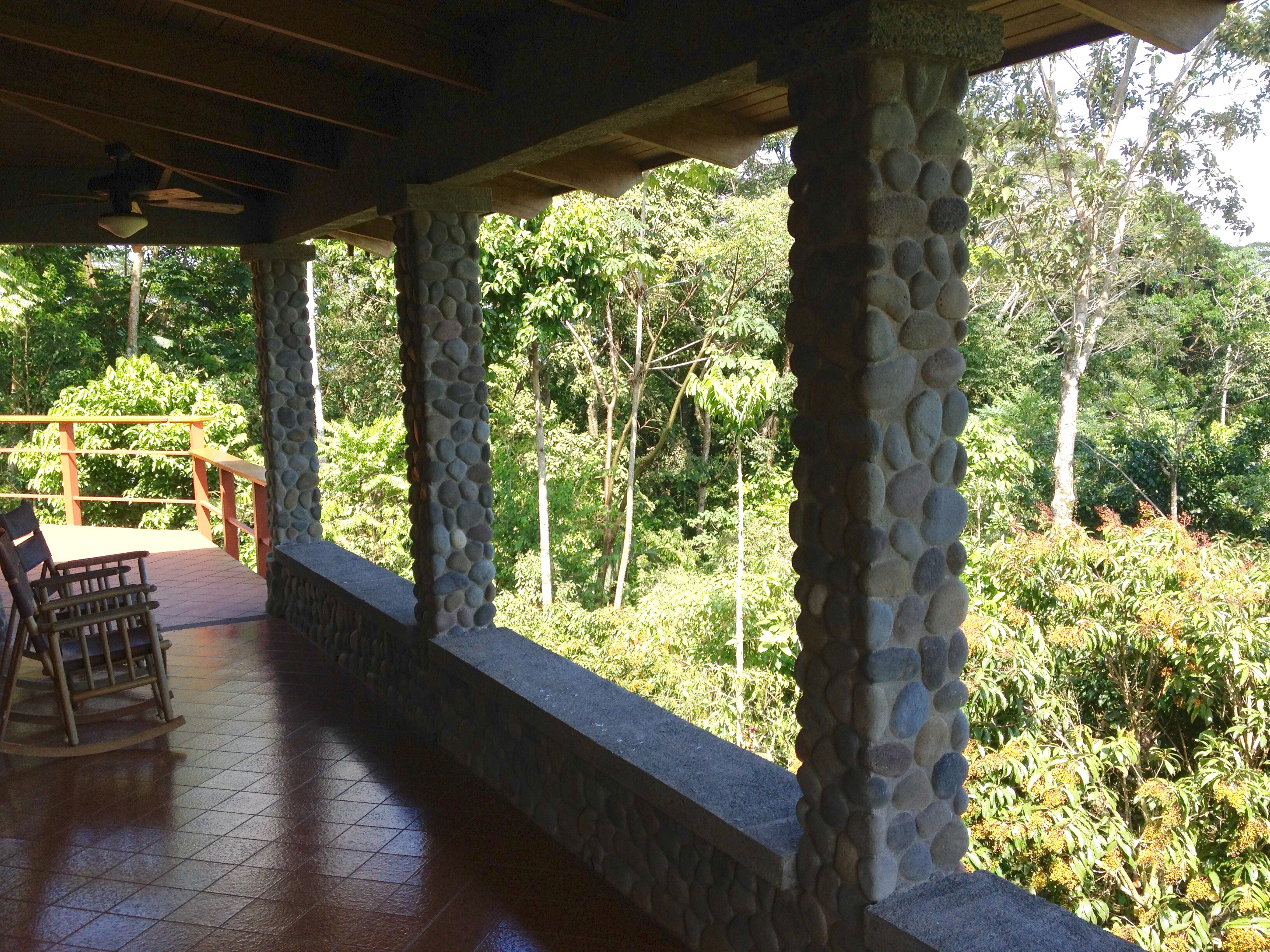 The porch and deck of our guesthouse. We actually do live in the jungle